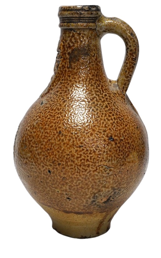 A 17th century Rhenish saltglazed Bellarmine, 23cm. Condition - commensurate with age